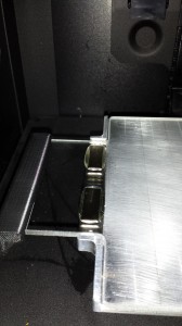 Magnet holding the plate in place